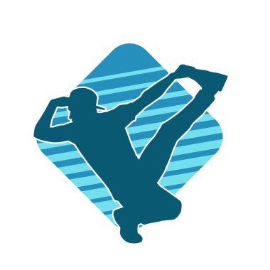 Hareket halindeki bir erkek dansçının silueti. Dans eden zayıf bir adamın silueti..