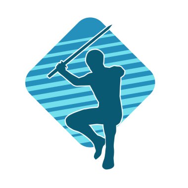 Bir erkek savaşçının silueti kılıçla poz veriyor. Kılıç taşıyan bir savaşçının silueti..