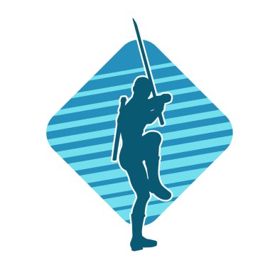 Bir erkek savaşçının silueti kılıçla poz veriyor. Kılıç taşıyan bir savaşçının silueti..