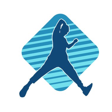 Hareket halindeki bir erkek dansçının silueti. Dans eden zayıf bir adamın silueti..