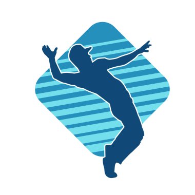 Hareket halindeki bir erkek dansçının silueti. Dans eden zayıf bir adamın silueti..