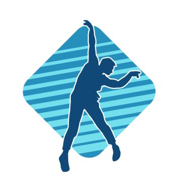 Hareket halindeki bir erkek dansçının silueti. Dans eden zayıf bir adamın silueti..