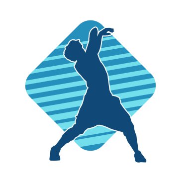 Hareket halindeki bir erkek dansçının silueti. Dans eden zayıf bir adamın silueti..