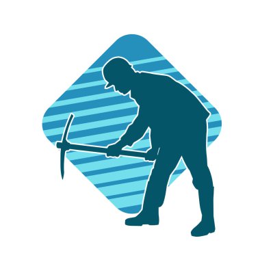 Görev sırasında baltayla dolaşan işçi kostümlü bir adamın silüeti. Bir madencinin hareket halindeki silueti balta aracı ile poz verir.