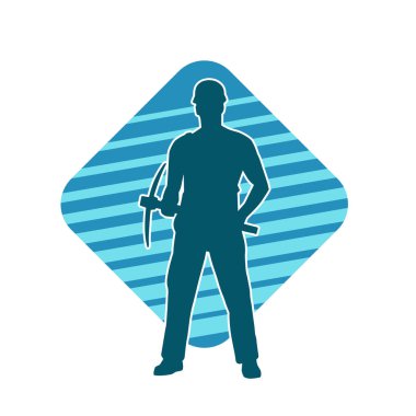 Görev sırasında baltayla dolaşan işçi kostümlü bir adamın silüeti. Bir madencinin hareket halindeki silueti balta aracı ile poz verir.