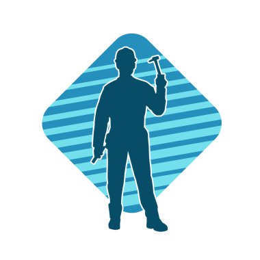 Çekiç aleti taşıyan bir işçinin silüeti. Hareket halindeki bir işçinin silueti çekiç aleti ile poz verir.