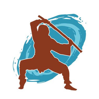 Samuray kılıcı taşıyan dövüş sanatları kostümlü bir erkek dövüşçünün silueti.. 