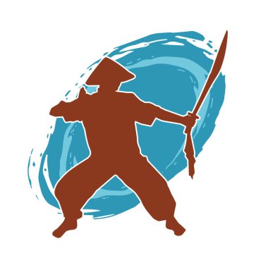 Samuray kılıcı taşıyan dövüş sanatları kostümlü bir erkek dövüşçünün silueti.. 