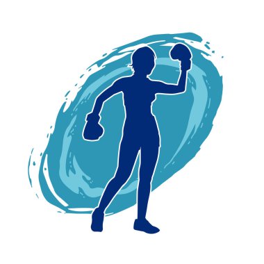 Kadın boks oyuncusunun silueti. Boks yaparken boks eldiveni giyen bir kadının silueti..