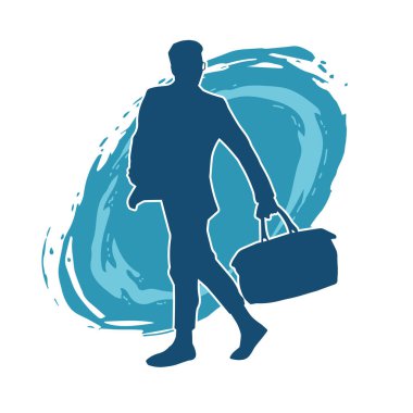 Evrak çantası taşıyan bir iş adamının silüeti.