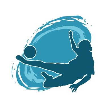 Topa vuran bayan futbolcunun silueti. Hareketli bir futbolcu kadının silueti..