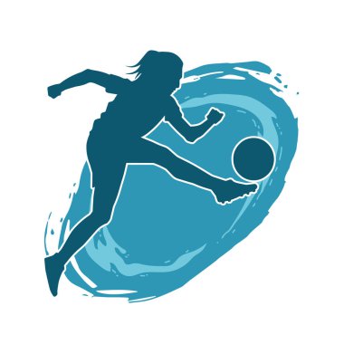 Topa vuran bayan futbolcunun silueti. Hareketli bir futbolcu kadının silueti..