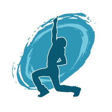 Hareket halindeki bir erkek dansçının silueti. Dans eden zayıf bir adamın silueti..