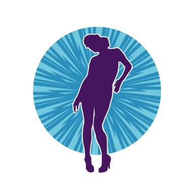 Hareketli pozlarda mini etek giyen bir kadın dansçının silueti. Zayıf bir kadının silueti mutlu bir şekilde dans ediyor..