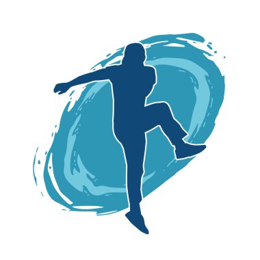 Dans eden bir adamın silueti. Erkek dansçı silueti poz veriyor..