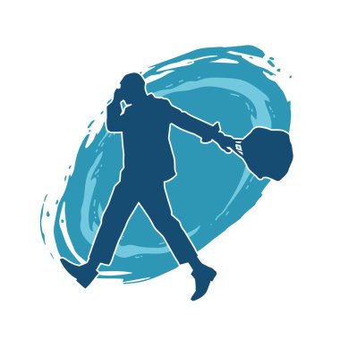 Evrak çantası taşıyan bir iş adamının silüeti.