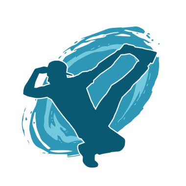 Hareket halindeki bir erkek dansçının silueti. Dans eden zayıf bir adamın silueti..