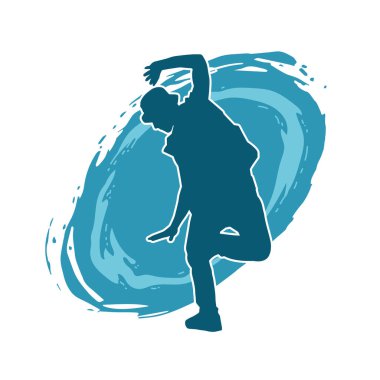 Hareket halindeki bir erkek dansçının silueti. Dans eden zayıf bir adamın silueti..