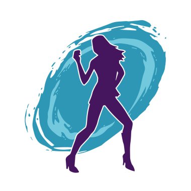 Hareketli pozlarda mini etek giyen bir kadın dansçının silueti. Zayıf bir kadının silueti mutlu bir şekilde dans ediyor..