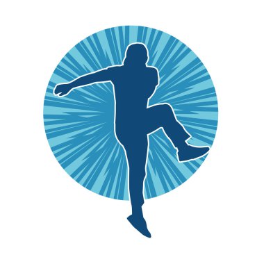 Hareket halindeki bir erkek dansçının silueti. Dans eden zayıf bir adamın silueti..