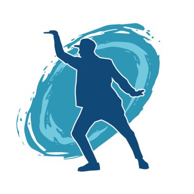 Hareket halindeki bir erkek dansçının silueti. Dans eden zayıf bir adamın silueti..