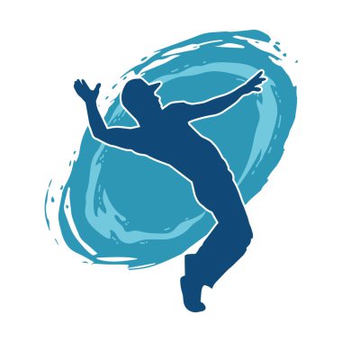 Hareket halindeki bir erkek dansçının silueti. Dans eden zayıf bir adamın silueti..