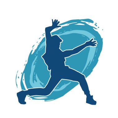 Hareket halindeki bir erkek dansçının silueti. Dans eden zayıf bir adamın silueti..