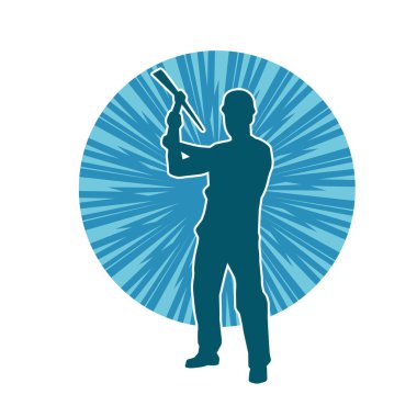 Görev sırasında baltayla dolaşan işçi kostümlü bir adamın silüeti. Bir madencinin hareket halindeki silueti balta aracı ile poz verir.