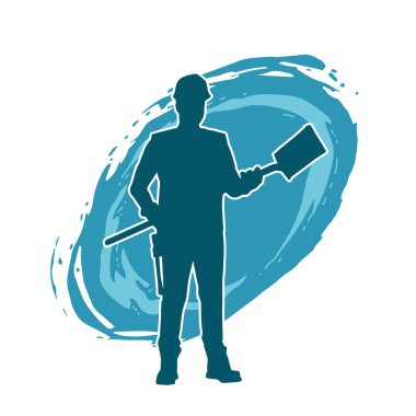 Kürek taşıyan bir işçinin silüeti. Bir işçinin hareket halindeki silueti kürek aracı kullanarak poz verir.