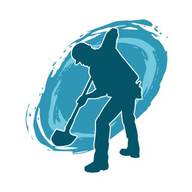 Kürek taşıyan bir işçinin silüeti. Bir işçinin hareket halindeki silueti kürek aracı kullanarak poz verir.