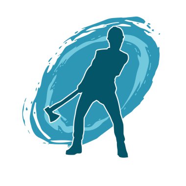 Hareket halindeki bir işçinin silueti, baltasını kullanarak poz verir..