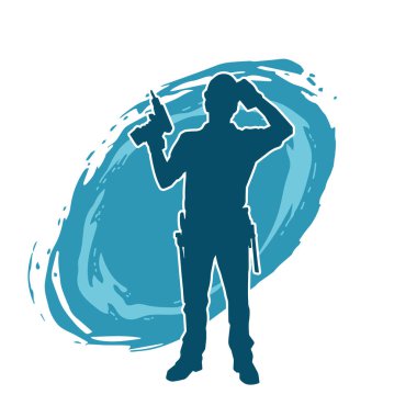 Matkap aletleri taşıyan inşaat işçisi kostümlü bir adamın silueti. İnşaat işçisi erkek silueti elektrikli matkapla hareket halinde poz veriyor. 