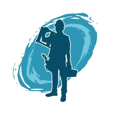 İnşaat işçisi kostümlü bir adamın silueti. İnşaat işçisinin silueti pozda.. 