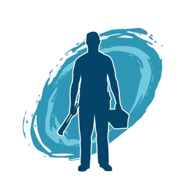 İnşaat işçisi kostümlü bir adamın silueti. İnşaat işçisinin silueti pozda.. 