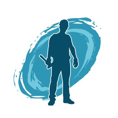 Çekiç aleti taşıyan bir işçinin silüeti. Hareket halindeki bir işçinin silueti çekiç aleti ile poz verir.