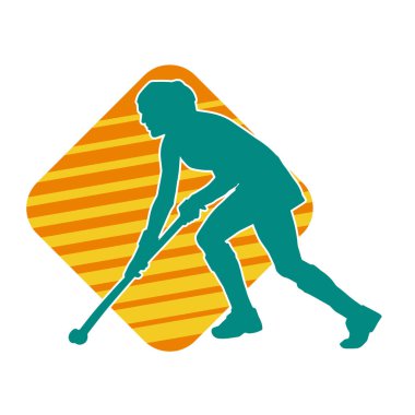 Çim hokeyi oynayan kadın atlet silueti. Çim hokeyi oynayan bir kadının silueti..