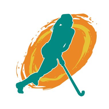 Çim hokeyi oynayan kadın atlet silueti. Çim hokeyi oynayan bir kadının silueti..