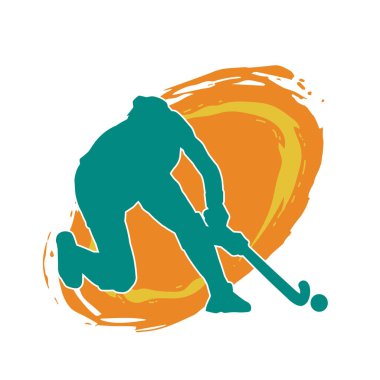 Çim hokeyi oynayan kadın atlet silueti. Çim hokeyi oynayan bir kadının silueti..