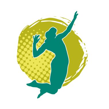 Hareketli bir kadın voleybol oyuncusunun silueti. Voleybol oynayan bir kadının silueti..