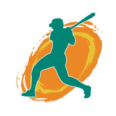 Hareketli bir erkek beyzbol oyuncusunun silueti. Vurucu olarak beyzbol oynayan bir adamın silueti..