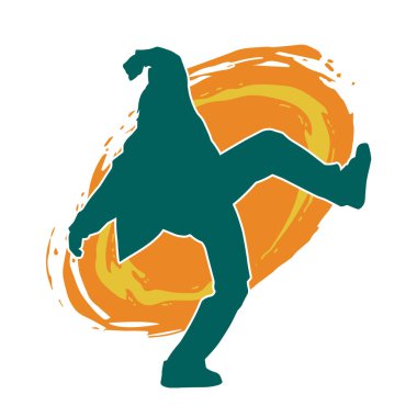 Hareket halindeki bir erkek dansçının silueti. Dans eden zayıf bir adamın silueti..