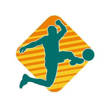 Top tekmeleyen bir erkek futbolcunun silueti. Hareket halindeki bir futbolcunun silueti.