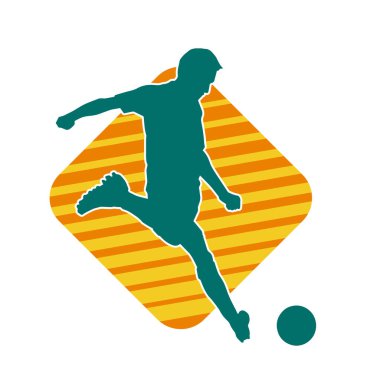 Top tekmeleyen bir erkek futbolcunun silueti. Hareket halindeki bir futbolcunun silueti.