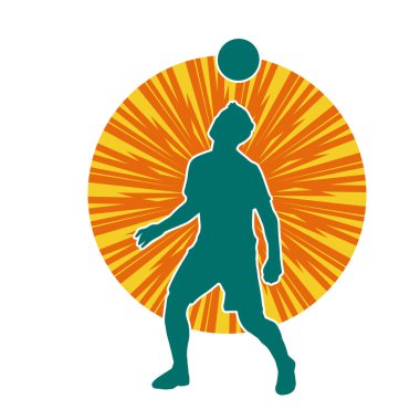 Top oynayan atletik bir adamın silueti. Top oynayan atletik vücutlu bir erkeğin silueti..