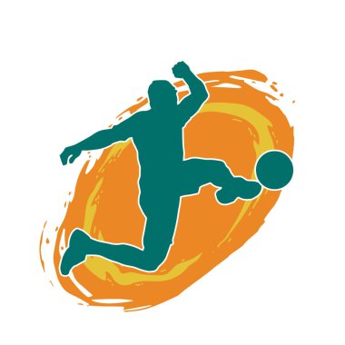 Top tekmeleyen bir erkek futbolcunun silueti. Hareket halindeki bir futbolcunun silueti.