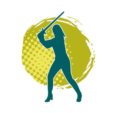 Bir kadın dövüşçünün silueti kılıç taşırken poz veriyor..