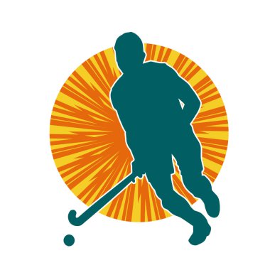 Erkek çim hokeyi atletinin silueti iş başında. Çim hokeyi oynayan bir adamın silueti..
