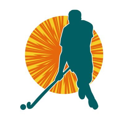 Erkek çim hokeyi atletinin silueti iş başında. Çim hokeyi oynayan bir adamın silueti..
