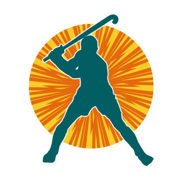 Erkek çim hokeyi atletinin silueti iş başında. Çim hokeyi oynayan bir adamın silueti..