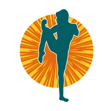 Hareketli kadın kickboksör atletinin silueti. Tekme atan bir kadının silueti..